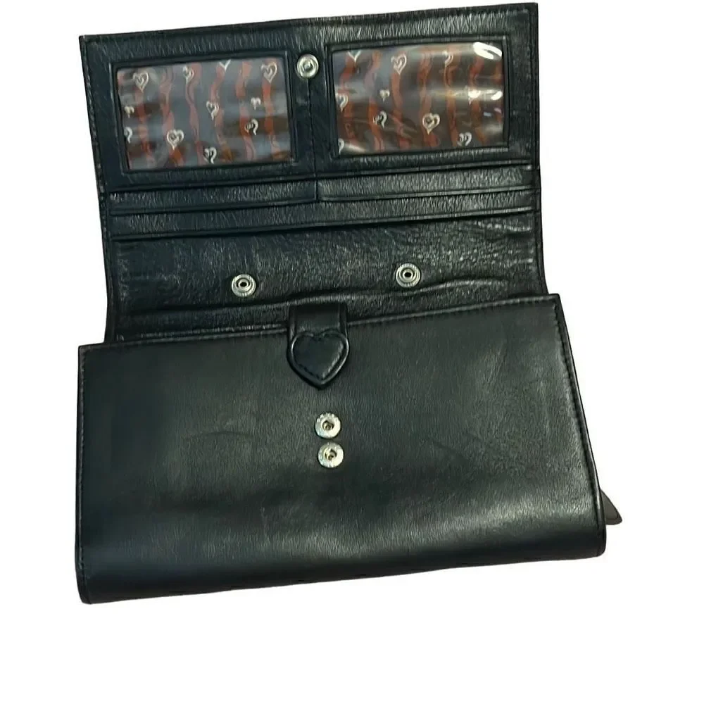 Well loved Brighton wallet. Still has a lot of life in it.